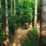 Person on bike riding on Whiskey Run Trails